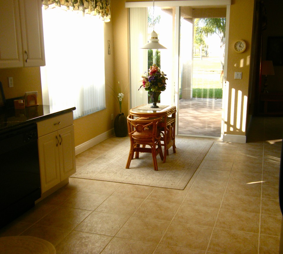 eat in kitchen with sliders opening to patio