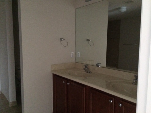master bath with dual sinks