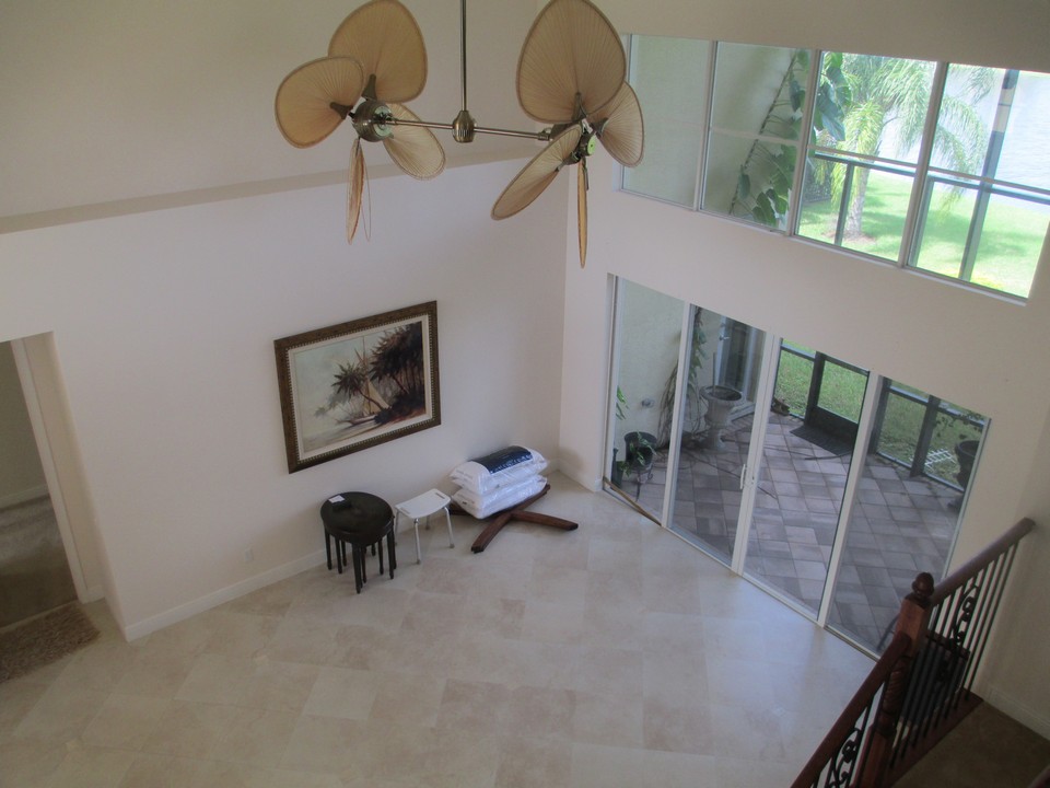 living room showing sliders and plant shelves