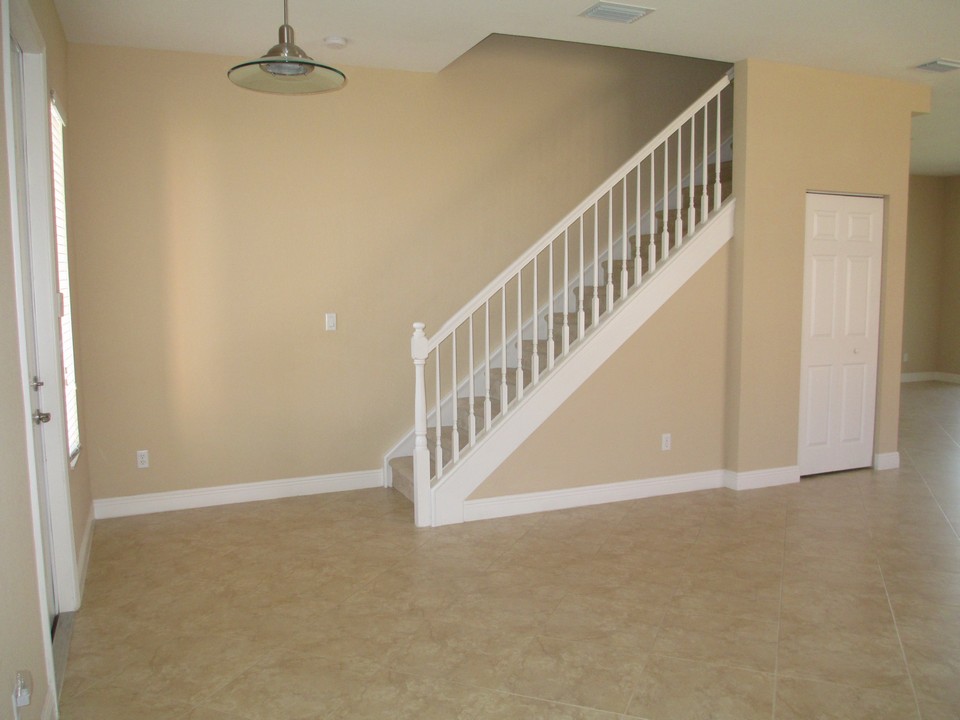 foyer-stairway-huge closet for extra strorage!