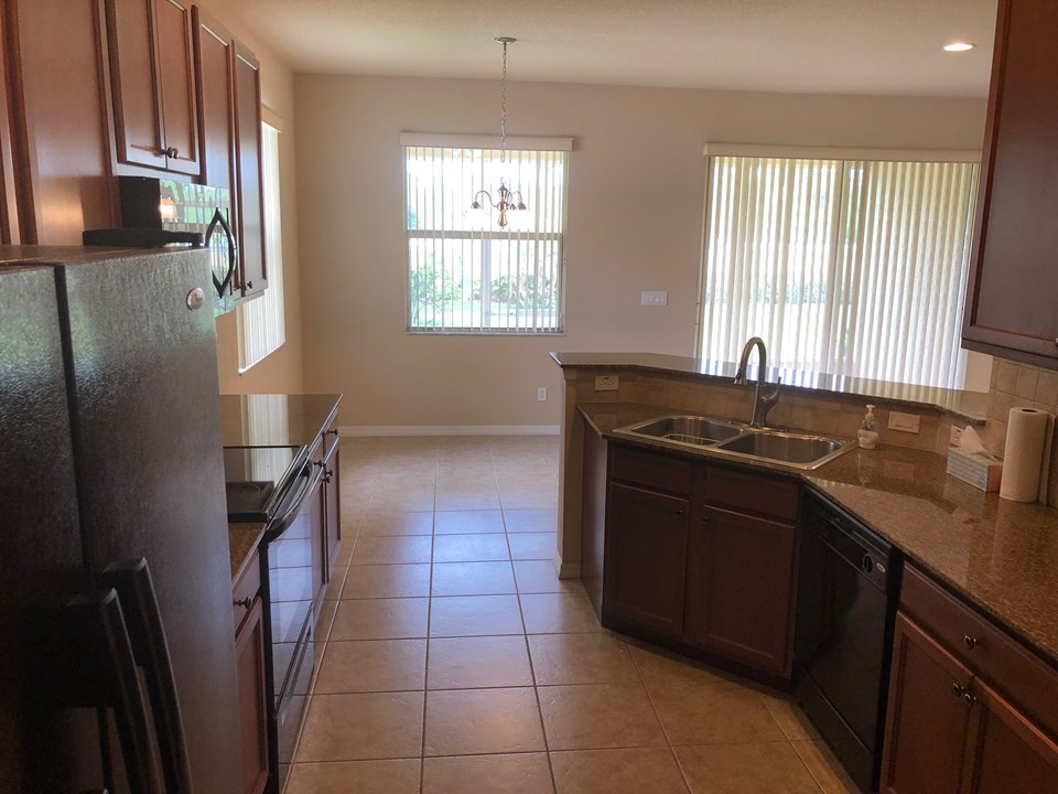 kitchen view from laundry room & breakfast area