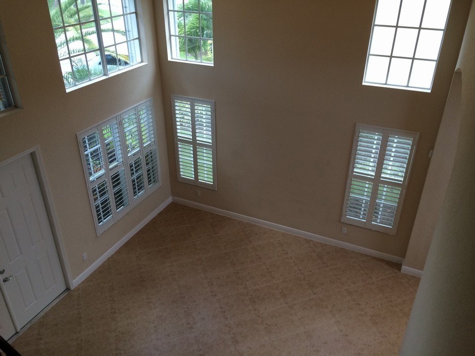 view from stairway looking at living room