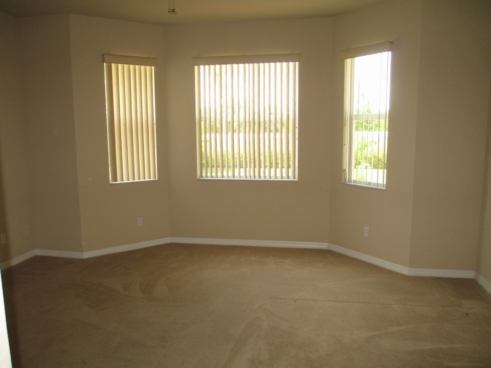 master bedroom with bay window