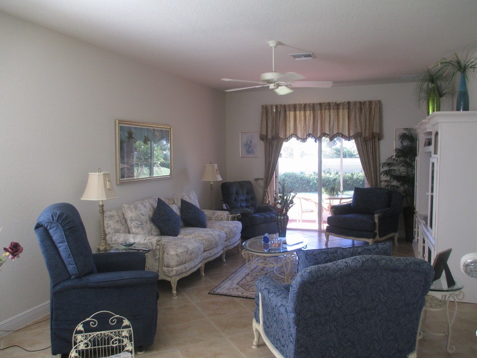 living room, diagonal tile, slider opening to patio