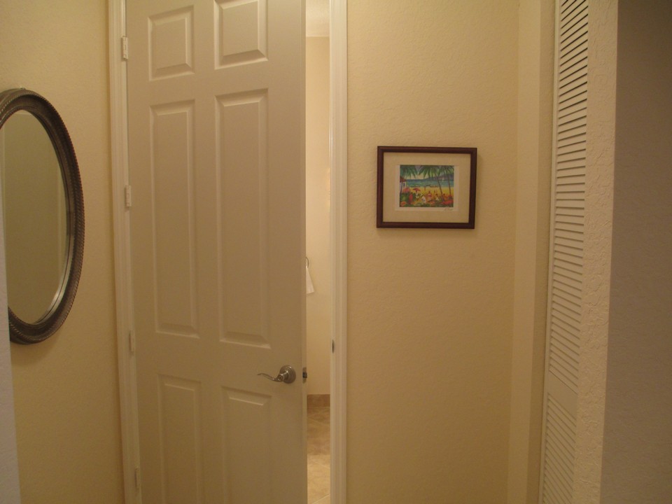hallway/entrance to second bathroom
