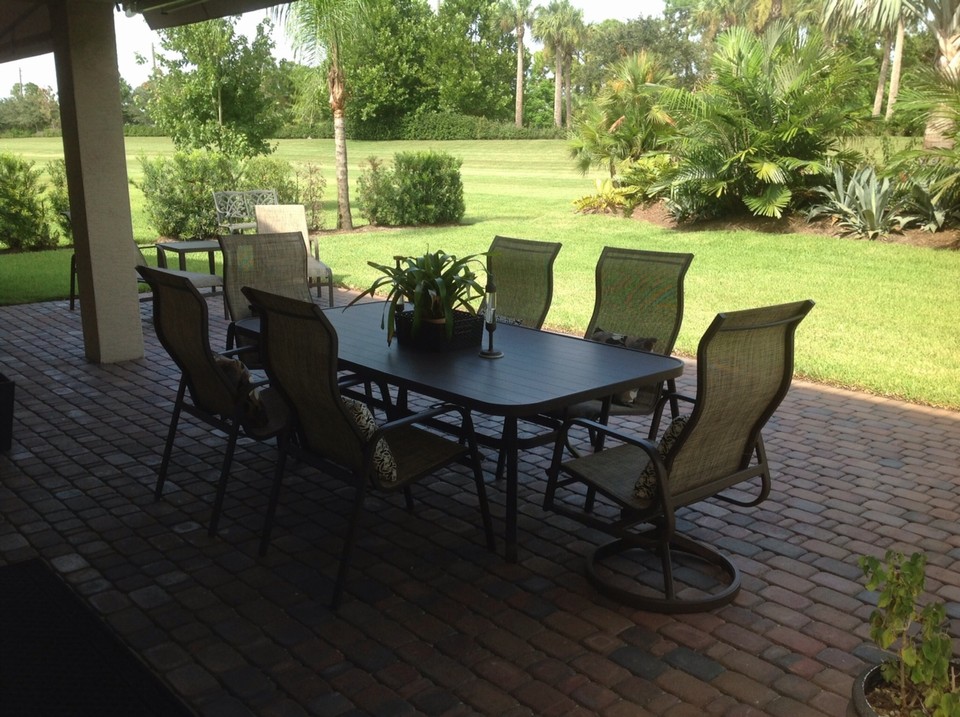 patio with open-private backyard and plenty of green space