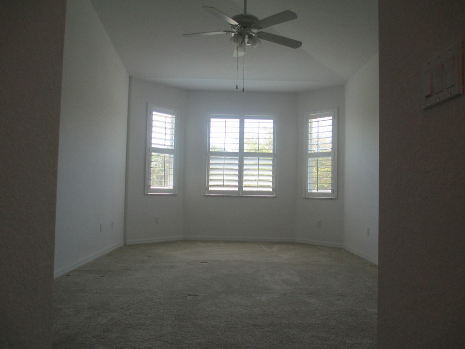 master bedroom, bay window, plantation shutters