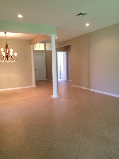 living & dining room with diagonal tiles