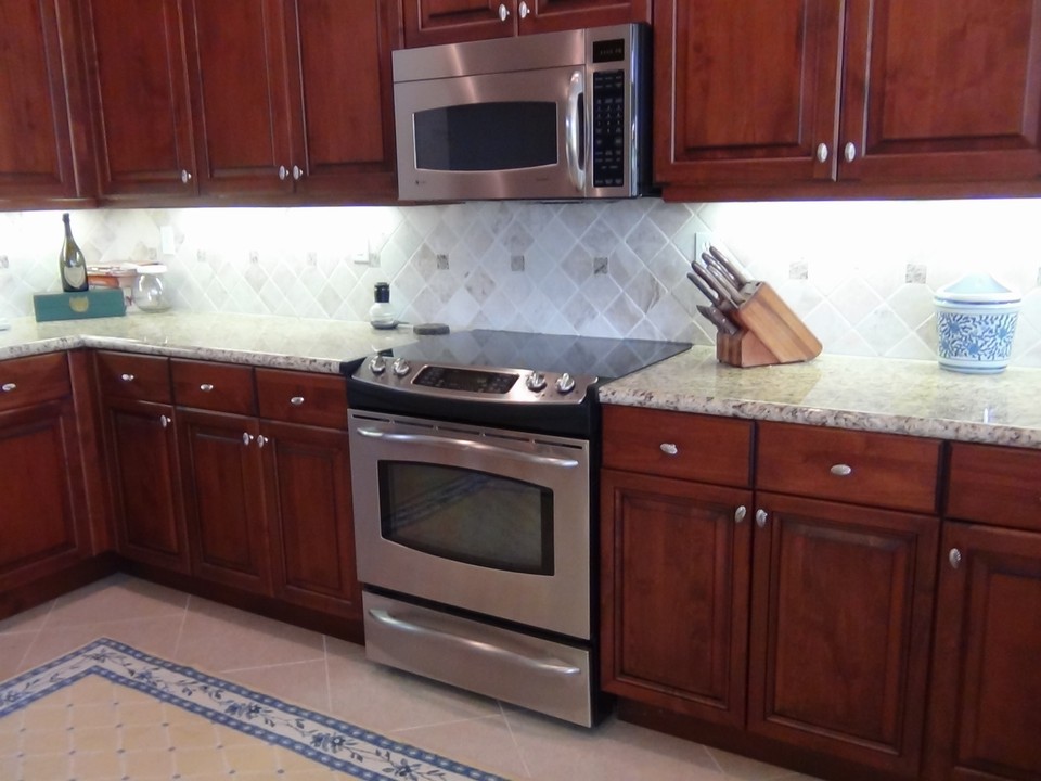 ss appliances, granite and tile back-spalsh