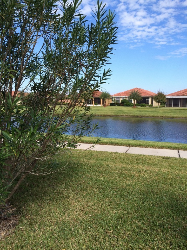 view of lake and walking trail