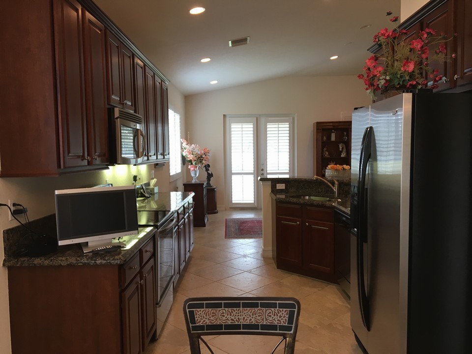 cherry cabinets, ss appliances