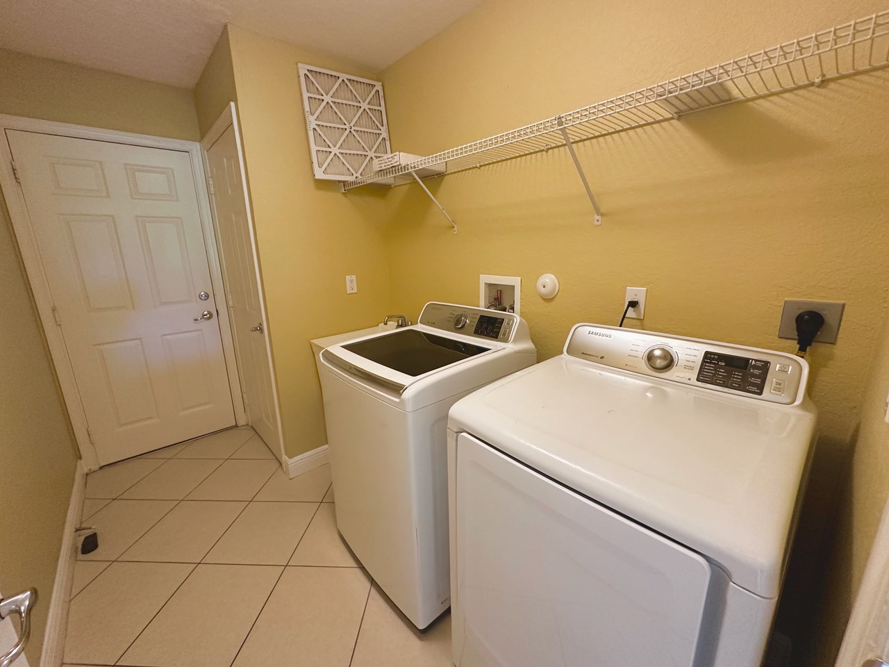 laundry room with full size washer & dryer