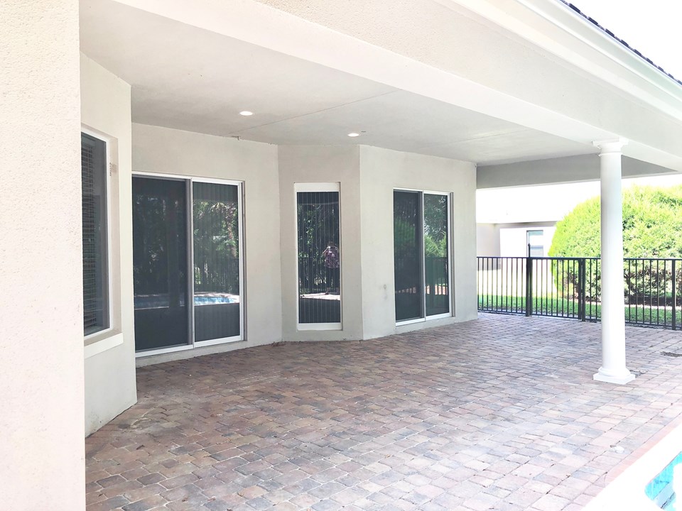 covered patio and pool
