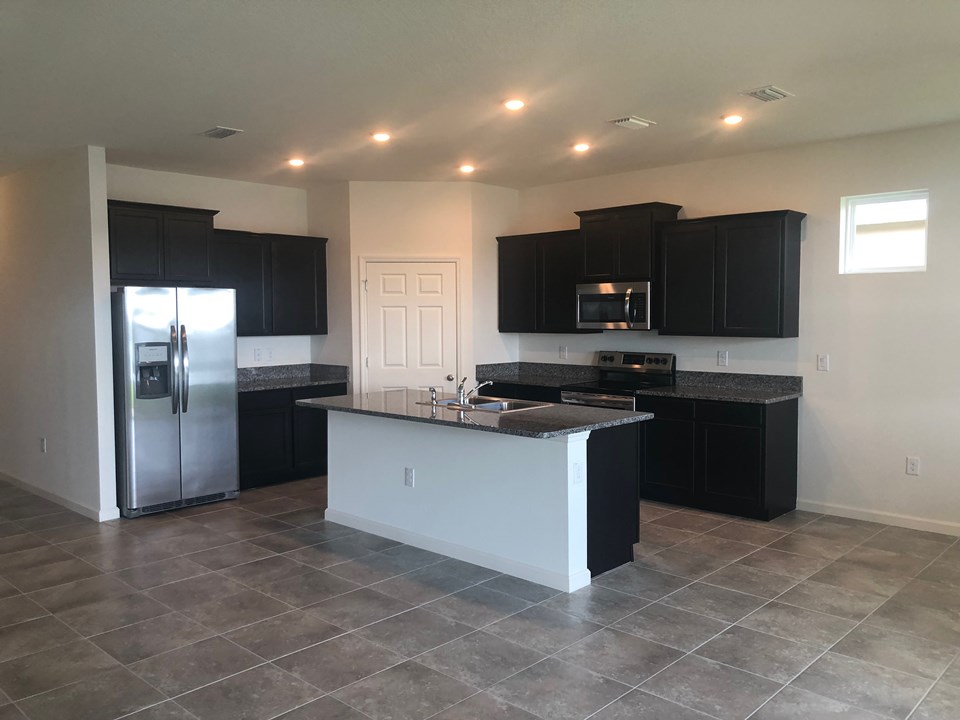 ss appliances, pantry and kitchen with hi-hats