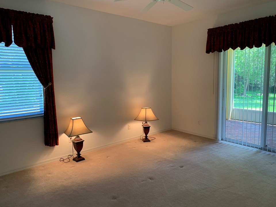 master bedroom with sliding doors to patio