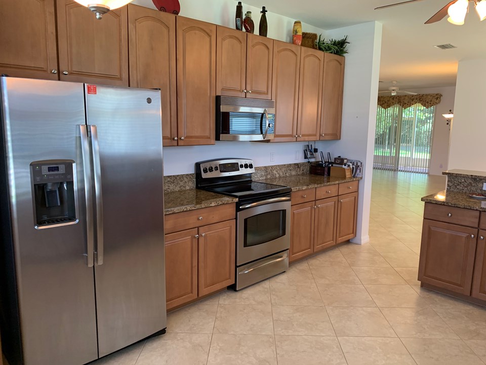 ss appliances, granite counters maple cabinets