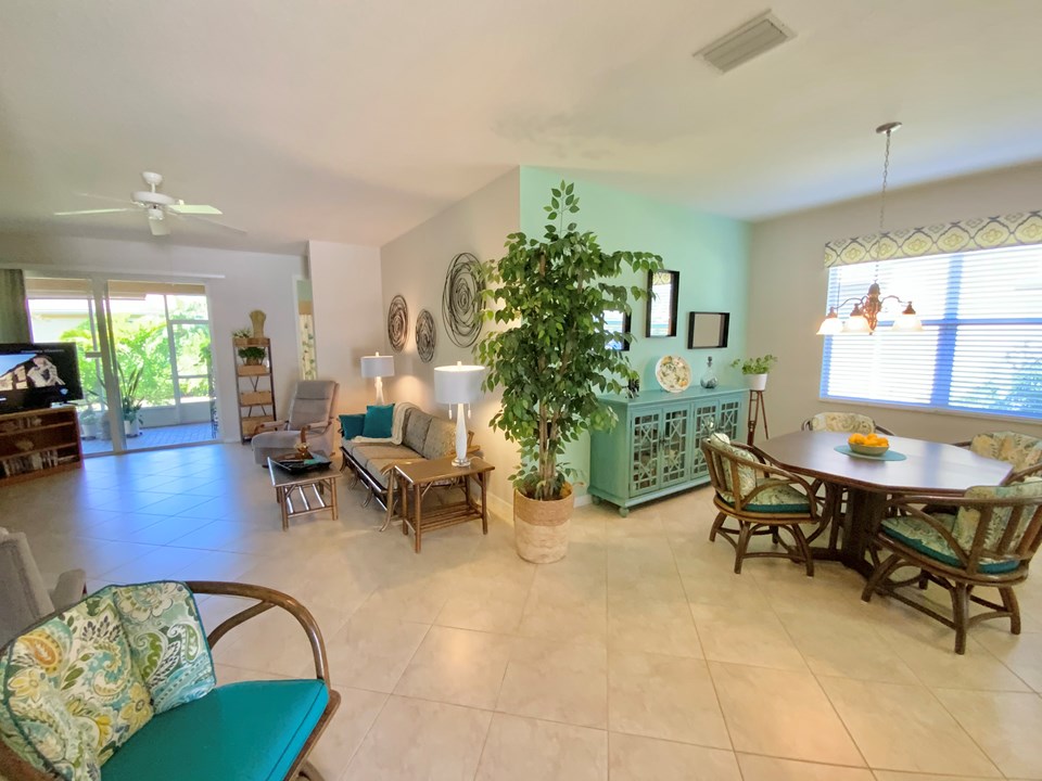 view from foyer to living room and dining room
