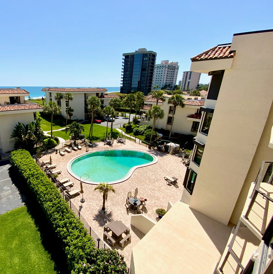 view of pool & complex