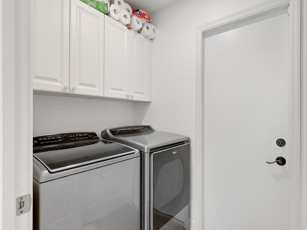 laundry room with cabinets