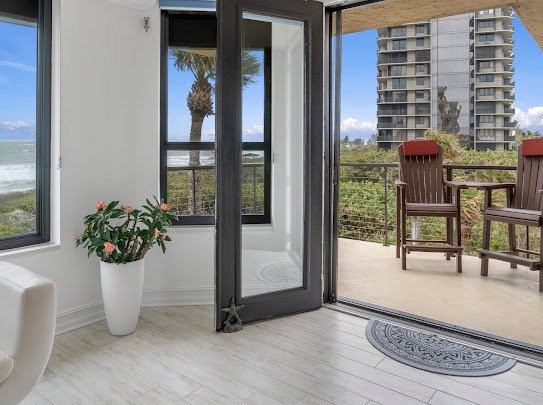 french doors open to balcony on top floor
