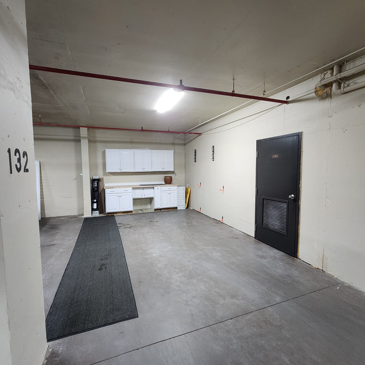 enclosed parking with storage on the right
