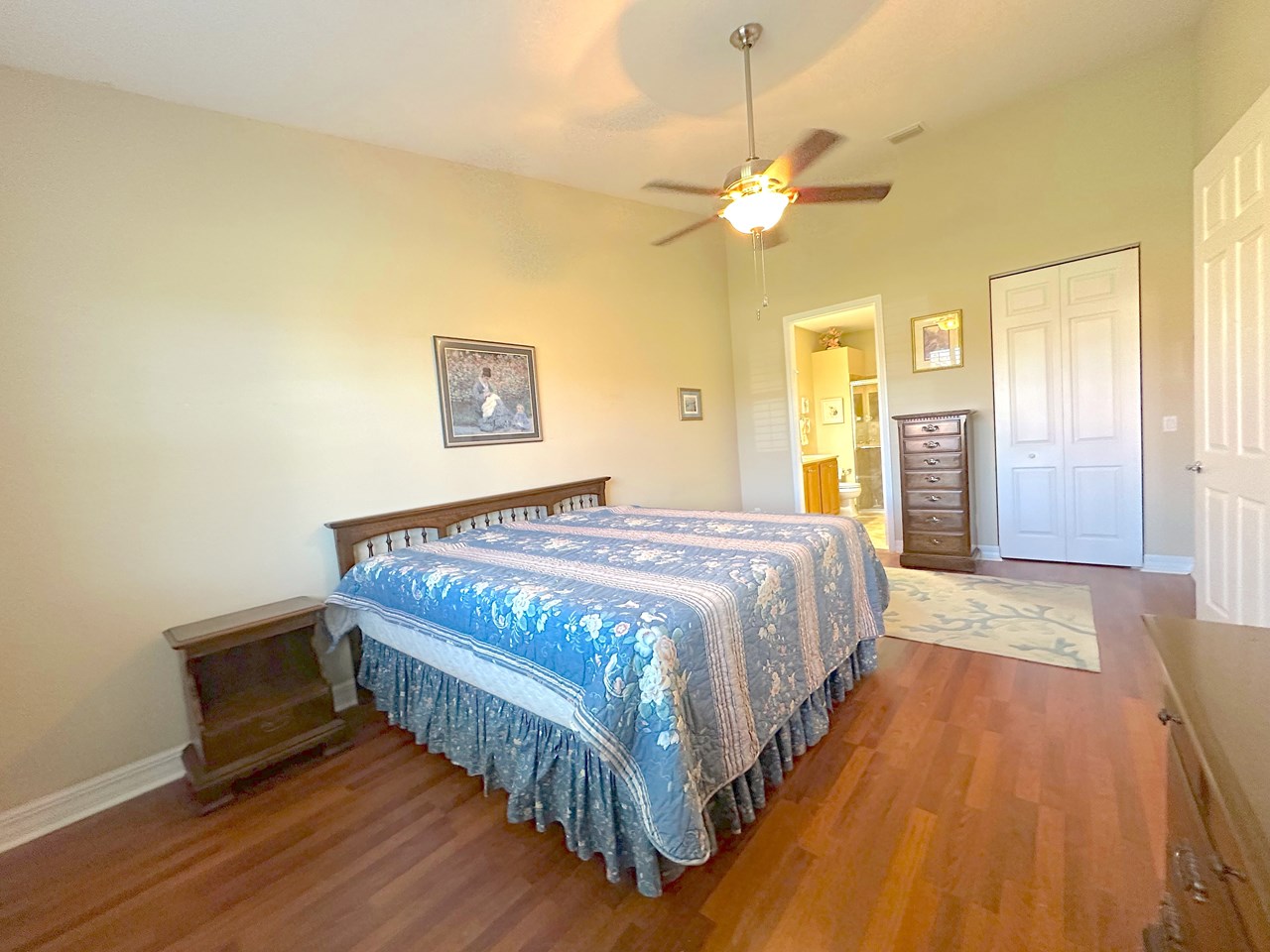 primary bedroom with king size bed